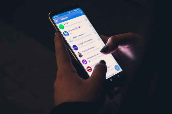A person using a mobile communications app